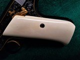 COLT - WOODSMAN MATCH TARGET BULLSEYE. 1ST SERIES. MFG. IN 1940. ENGRAVED BY CLINT FINLEY. W-REAL IVORY. GORGEOUS WORK OF ART! - .22 LR - 10 of 10