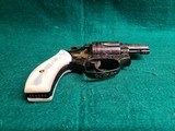 Smith & Wesson - MODEL 36 FLAT LATCH - BEAUTIFULLY ENGRAVED BY CECIL MILLS W-GOLD INLAYS. REAL PEARL GRIPS. MFG. CIRCA 1950-1969 - .38 Special - 20 of 25
