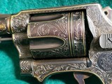 Smith & Wesson - MODEL 36 FLAT LATCH - BEAUTIFULLY ENGRAVED BY CECIL MILLS W-GOLD INLAYS. REAL PEARL GRIPS. MFG. CIRCA 1950-1969 - .38 Special - 15 of 25