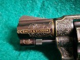 Smith & Wesson - MODEL 36 FLAT LATCH - BEAUTIFULLY ENGRAVED BY CECIL MILLS W-GOLD INLAYS. REAL PEARL GRIPS. MFG. CIRCA 1950-1969 - .38 Special - 17 of 25