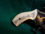 Smith & Wesson - MODEL 36 FLAT LATCH - BEAUTIFULLY ENGRAVED BY CECIL MILLS W-GOLD INLAYS. REAL PEARL GRIPS. MFG. CIRCA 1950-1969 - .38 Special - 8 of 25