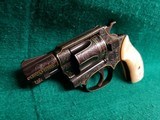 Smith & Wesson - MODEL 36 FLAT LATCH - BEAUTIFULLY ENGRAVED BY CECIL MILLS W-GOLD INLAYS. REAL PEARL GRIPS. MFG. CIRCA 1950-1969 - .38 Special - 5 of 25
