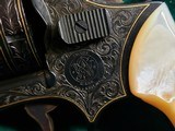Smith & Wesson - MODEL 36 FLAT LATCH - BEAUTIFULLY ENGRAVED BY CECIL MILLS W-GOLD INLAYS. REAL PEARL GRIPS. MFG. CIRCA 1950-1969 - .38 Special - 13 of 25