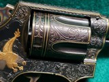 Smith & Wesson - MODEL 36 FLAT LATCH - BEAUTIFULLY ENGRAVED BY CECIL MILLS W-GOLD INLAYS. REAL PEARL GRIPS. MFG. CIRCA 1950-1969 - .38 Special - 16 of 25