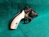Smith & Wesson - MODEL 36 FLAT LATCH - BEAUTIFULLY ENGRAVED BY CECIL MILLS W-GOLD INLAYS. REAL PEARL GRIPS. MFG. CIRCA 1950-1969 - .38 Special - 2 of 25