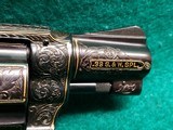 Smith & Wesson - MODEL 36 FLAT LATCH - BEAUTIFULLY ENGRAVED BY CECIL MILLS W-GOLD INLAYS. REAL PEARL GRIPS. MFG. CIRCA 1950-1969 - .38 Special - 12 of 25