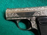 BROWNING - BABY BROWNING. MASTERFULLY ENGRAVED BY CLINT FINLEY. W-ONE MAGAZINE. GORGEOUS PISTOL! MFG. IN 1968 - 25 ACP - 22 of 22
