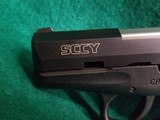 SCCY - CPX-2. 3 INCH BARREL. W-TWO 10 ROUND MAGAZINES. MINTY BORE. NEAR NEW! IN ORIGINAL BOX! - 9MM - 14 of 22