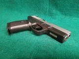 Smith & Wesson - MODEL SW40VE. STAINLESS SLIDE. 4 INCH BARREL. W-ONE 10 ROUND MAGAZINE. NEAR NEW! - .40 S&W - 8 of 19