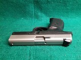 Smith & Wesson - MODEL SW40VE. STAINLESS SLIDE. 4 INCH BARREL. W-ONE 10 ROUND MAGAZINE. NEAR NEW! - .40 S&W - 11 of 19