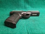Smith & Wesson - MODEL SW40VE. STAINLESS SLIDE. 4 INCH BARREL. W-ONE 10 ROUND MAGAZINE. NEAR NEW! - .40 S&W - 7 of 19