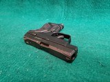 RUGER - LCP II. BLACK. 2.75" BARREL. W-ORIGINAL BOX, HOLSTER, PAPERS, AND ONE MAGAZINE. NEAR NEW! - .380 ACP - 17 of 17