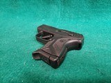 RUGER - LCP II. BLACK. 2.75" BARREL. W-ORIGINAL BOX, HOLSTER, PAPERS, AND ONE MAGAZINE. NEAR NEW! - .380 ACP - 16 of 17