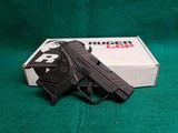 RUGER - LCP II. BLACK. 2.75" BARREL. W-ORIGINAL BOX, HOLSTER, PAPERS, AND ONE MAGAZINE. NEAR NEW! - .380 ACP - 1 of 17