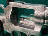 RUGER - SECURITY SIX. STAINLESS. DOUBLE ACTION. 6 INCH BARREL. ENGRAVED BY CLINT FINLEY.GORGEOUS! MFG. IN 1977 - .357 MAGNUM - 21 of 21