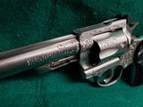 RUGER - SECURITY SIX. STAINLESS. DOUBLE ACTION. 6 INCH BARREL. ENGRAVED BY CLINT FINLEY.GORGEOUS! MFG. IN 1977 - .357 MAGNUM - 16 of 21