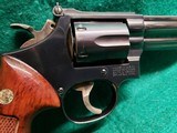Smith & Wesson - MODEL 19-5. BLUED. 6 INCH BARREL. 6-SHOT DOUBLE ACTION. MINTY BORE! MFG. IN MID 80'S - .357 Magnum - 15 of 20