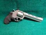 Taurus - TRACKER MODEL 991. STAINLESS. 6.5 INCH BARREL. DOUBLE ACTION. 9 SHOT. LARGE FRAME. MINTY BORE! VERY NICE! - .22 Magnum - 1 of 17