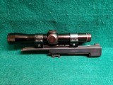Smith & Wesson - MODEL 41 WITH 2 BARRELS (5.5 AND 7 INCH). LEUPOLD SCOPE. 3 MAGAZINES. AND 3 SETS OF GRIPS. NEAR MINT! - .22 LR - 19 of 25