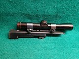 Smith & Wesson - MODEL 41 WITH 2 BARRELS (5.5 AND 7 INCH). LEUPOLD SCOPE. 3 MAGAZINES. AND 3 SETS OF GRIPS. NEAR MINT! - .22 LR - 20 of 25