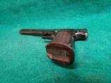 Smith & Wesson - MODEL 41 WITH 2 BARRELS (5.5 AND 7 INCH). LEUPOLD SCOPE. 3 MAGAZINES. AND 3 SETS OF GRIPS. NEAR MINT! - .22 LR - 13 of 25
