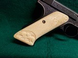 Colt - WOODSMAN. MATCH TARGET BULLSEYE. ENGRAVED BY VALENYA W-SILVER INLAYS. CARVED IVORY GRIPS. GORGEOUS PISTOL! MFG. 1939 - .22 LR - 11 of 18