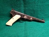Colt - WOODSMAN. MATCH TARGET BULLSEYE. ENGRAVED BY VALENYA W-SILVER INLAYS. CARVED IVORY GRIPS. GORGEOUS PISTOL! MFG. 1939 - .22 LR - 1 of 18