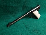 COLT - WOODSMAN. FIRST SERIES. 6.5 INCH BARREL. W-ONE MAG. W-BEAUTIFUL HAND CARVED IVORY GRIPS. NICE BORE! MFG. IN 1939 - .22 LR - 5 of 23