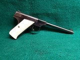 COLT - WOODSMAN. FIRST SERIES. 6.5 INCH BARREL. W-ONE MAG. W-BEAUTIFUL HAND CARVED IVORY GRIPS. NICE BORE! MFG. IN 1939 - .22 LR - 1 of 23