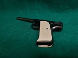 COLT - WOODSMAN. FIRST SERIES. 6.5 INCH BARREL. W-ONE MAG. W-BEAUTIFUL HAND CARVED IVORY GRIPS. NICE BORE! MFG. IN 1939 - .22 LR - 10 of 23