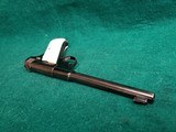 COLT - WOODSMAN. FIRST SERIES. 6.5 INCH BARREL. W-ONE MAG. W-BEAUTIFUL HAND CARVED IVORY GRIPS. NICE BORE! MFG. IN 1939 - .22 LR - 12 of 23