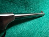 COLT - WOODSMAN. FIRST SERIES. 6.5 INCH BARREL. W-ONE MAG. W-BEAUTIFUL HAND CARVED IVORY GRIPS. NICE BORE! MFG. IN 1939 - .22 LR - 14 of 23