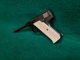 COLT - WOODSMAN. FIRST SERIES. 6.5 INCH BARREL. W-ONE MAG. W-BEAUTIFUL HAND CARVED IVORY GRIPS. NICE BORE! MFG. IN 1939 - .22 LR - 6 of 23