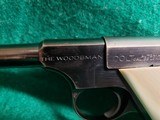 COLT - WOODSMAN. FIRST SERIES. 6.5 INCH BARREL. W-ONE MAG. W-BEAUTIFUL HAND CARVED IVORY GRIPS. NICE BORE! MFG. IN 1939 - .22 LR - 23 of 23