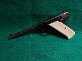 COLT - WOODSMAN. FIRST SERIES. 6.5 INCH BARREL. W-ONE MAG. W-BEAUTIFUL HAND CARVED IVORY GRIPS. NICE BORE! MFG. IN 1939 - .22 LR - 4 of 23