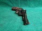 Smith & Wesson - MODEL 15-4. BLUED. DOUBLE ACTION. 4 INCH BARREL. PACHMAYR GRIPS. BEAUTIFUL GUN W-NICE BORE! MFG. IN 1981 - .38 SPECIAL - 16 of 25
