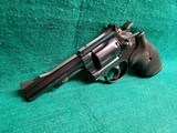 Smith & Wesson - MODEL 15-4. BLUED. DOUBLE ACTION. 4 INCH BARREL. PACHMAYR GRIPS. BEAUTIFUL GUN W-NICE BORE! MFG. IN 1981 - .38 SPECIAL - 5 of 25