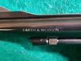 Smith & Wesson - MODEL 15-4. BLUED. DOUBLE ACTION. 4 INCH BARREL. PACHMAYR GRIPS. BEAUTIFUL GUN W-NICE BORE! MFG. IN 1981 - .38 SPECIAL - 18 of 25