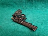 Smith & Wesson - MODEL 15-4. BLUED. DOUBLE ACTION. 4 INCH BARREL. PACHMAYR GRIPS. BEAUTIFUL GUN W-NICE BORE! MFG. IN 1981 - .38 SPECIAL - 24 of 25