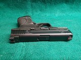 Smith & Wesson - M&P9C. COMPACT. 3.5" BARREL. IN ORIGINAL CASE. W-2 10 MAGS AND BACK STRAPS. TRIJICON HD NIGHT SIGHTS. NEAR NEW! - 9mm Luger - 12 of 23