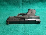 Smith & Wesson - M&P9C. COMPACT. 3.5" BARREL. IN ORIGINAL CASE. W-2 10 MAGS AND BACK STRAPS. TRIJICON HD NIGHT SIGHTS. NEAR NEW! - 9mm Luger - 11 of 23