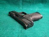 Smith & Wesson - M&P9C. COMPACT. 3.5" BARREL. IN ORIGINAL CASE. W-2 10 MAGS AND BACK STRAPS. TRIJICON HD NIGHT SIGHTS. NEAR NEW! - 9mm Luger - 13 of 23