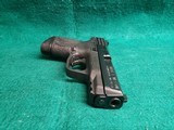 Smith & Wesson - M&P9C. COMPACT. 3.5" BARREL. IN ORIGINAL CASE. W-2 10 MAGS AND BACK STRAPS. TRIJICON HD NIGHT SIGHTS. NEAR NEW! - 9mm Luger - 22 of 23