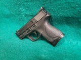 Smith & Wesson - M&P9C. COMPACT. 3.5" BARREL. IN ORIGINAL CASE. W-2 10 MAGS AND BACK STRAPS. TRIJICON HD NIGHT SIGHTS. NEAR NEW! - 9mm Luger - 7 of 23
