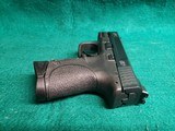 Smith & Wesson - M&P9C. COMPACT. 3.5" BARREL. IN ORIGINAL CASE. W-2 10 MAGS AND BACK STRAPS. TRIJICON HD NIGHT SIGHTS. NEAR NEW! - 9mm Luger - 10 of 23