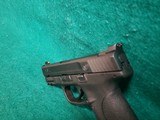 Smith & Wesson - M&P9C. COMPACT. 3.5" BARREL. IN ORIGINAL CASE. W-2 10 MAGS AND BACK STRAPS. TRIJICON HD NIGHT SIGHTS. NEAR NEW! - 9mm Luger - 23 of 23
