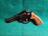 TAURUS - 669 COMP. DOUBLE ACTION REVOLVER. BLUED. 4" PORTED BARREL. W-ORIGINAL BOX AND OWNERS MANUAL. EXCELLENT CONDITION! - .357 MAGNUM - 5 of 18