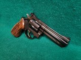 TAURUS - 669 COMP. DOUBLE ACTION REVOLVER. BLUED. 4" PORTED BARREL. W-ORIGINAL BOX AND OWNERS MANUAL. EXCELLENT CONDITION! - .357 MAGNUM - 4 of 18