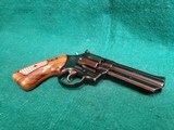 TAURUS - 669 COMP. DOUBLE ACTION REVOLVER. BLUED. 4" PORTED BARREL. W-ORIGINAL BOX AND OWNERS MANUAL. EXCELLENT CONDITION! - .357 MAGNUM - 11 of 18