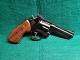 TAURUS - 669 COMP. DOUBLE ACTION REVOLVER. BLUED. 4" PORTED BARREL. W-ORIGINAL BOX AND OWNERS MANUAL. EXCELLENT CONDITION! - .357 MAGNUM - 2 of 18